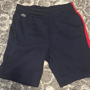 Lacoste Boys Navy Shorts with Red Side Stripe